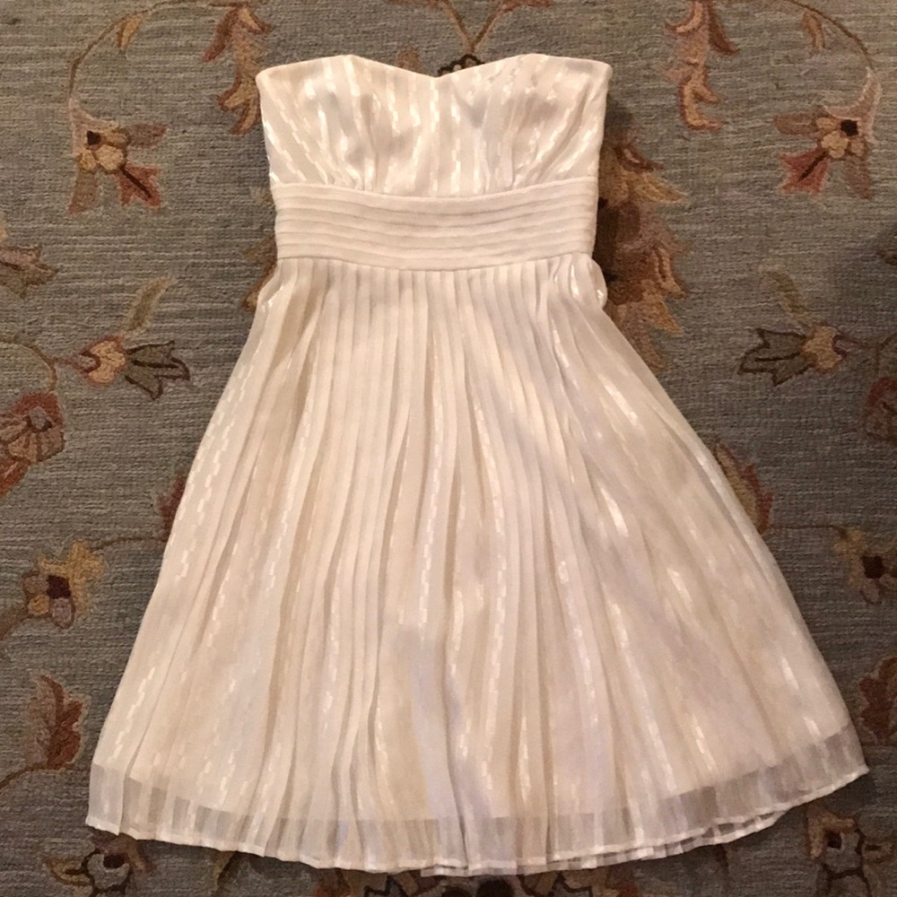 White pleated strapless cocktail dress